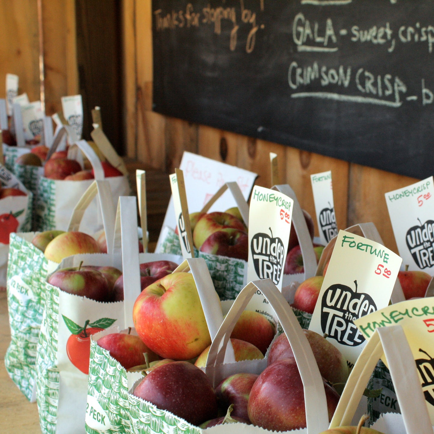 The farmstand is open and full of apples!